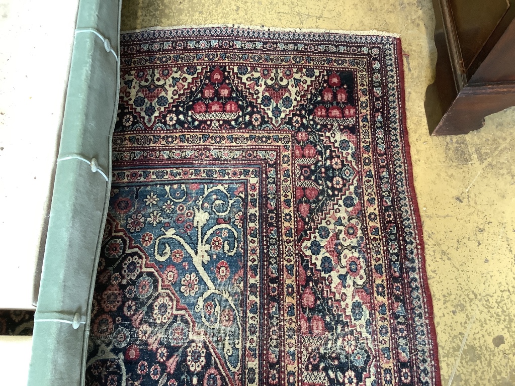 An Isphahan blue ground rug, 248 x 140cm